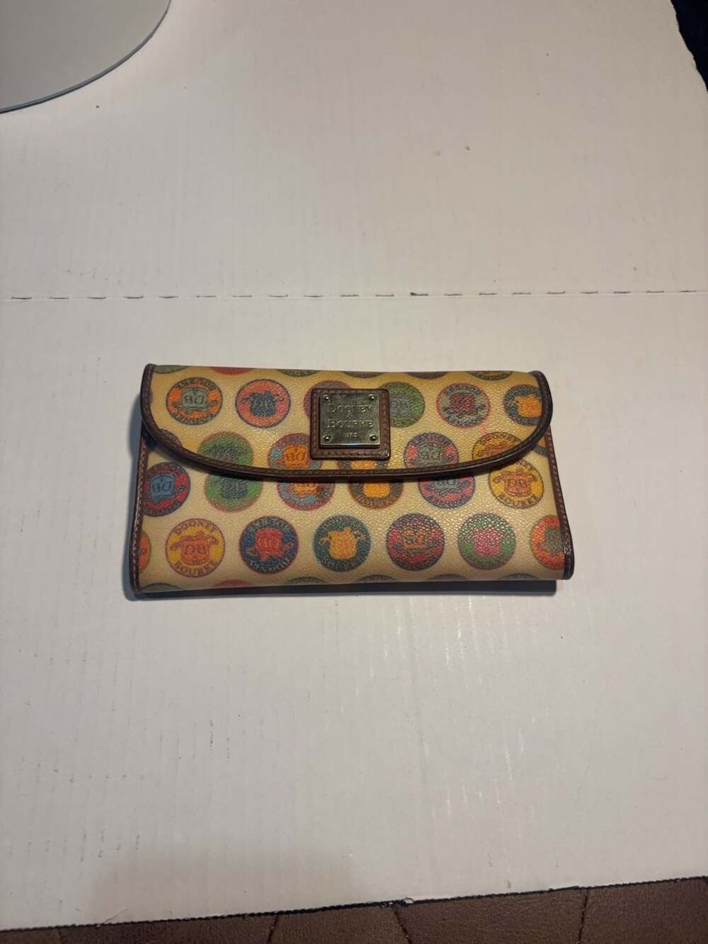 Dooney & Bourke Vintage Signature Logo Stamp Medallion Canvas Trifold Wallet